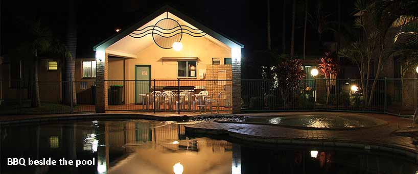 BBQ beside pool Aqua Villa  Coffs Harbour API.jpg (1) (1) (1)